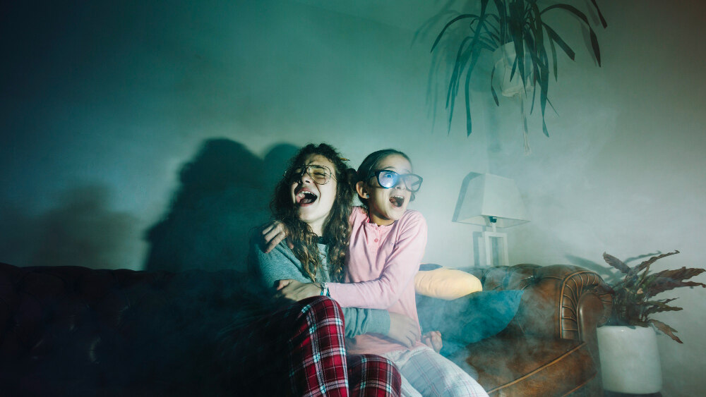 scared girls watching tv